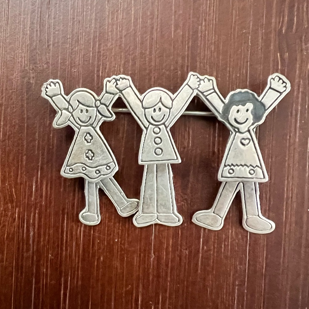Vintage “Happy Kids” 925 Mexico articulated brooch.